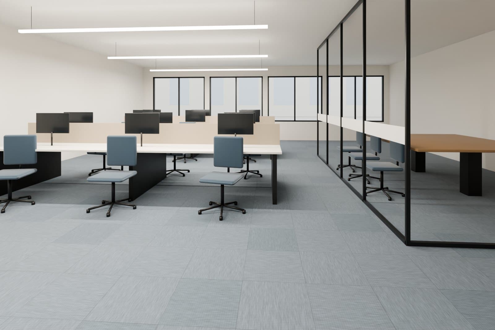 Open office with carpet tile flooring and a glass-walled meeting room