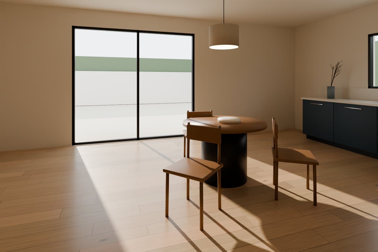 Dining area beside a sliding glass door in an ADU with pale oak plank flooring